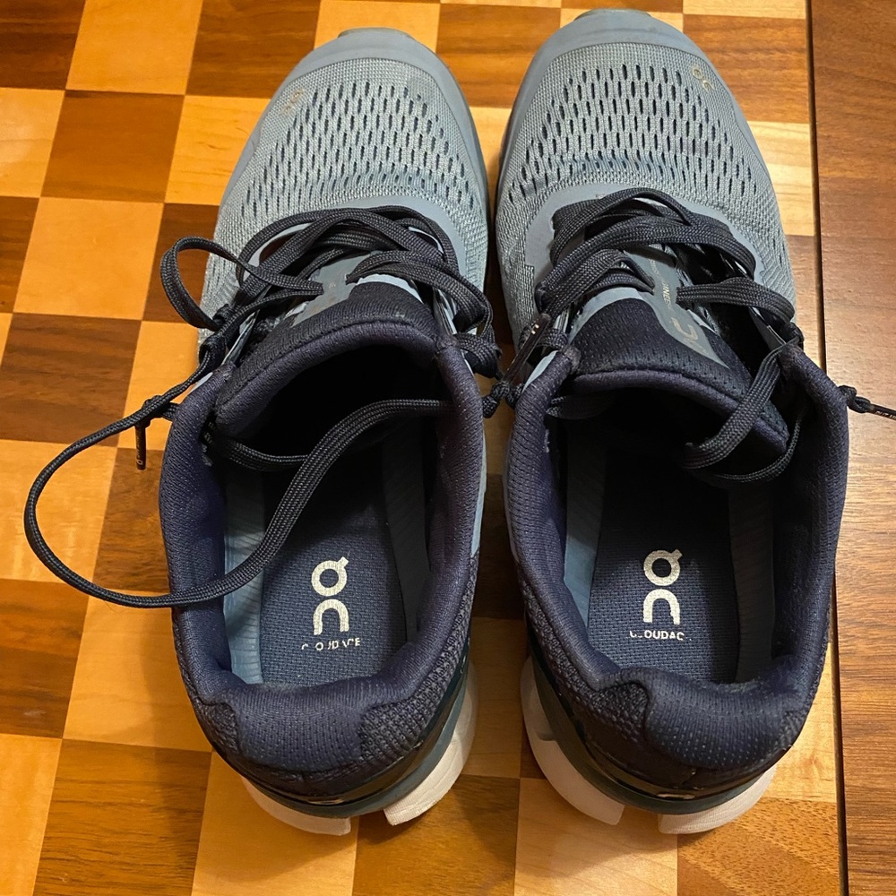 On Cloud Ace size 7 1/2. Slate blue in color.